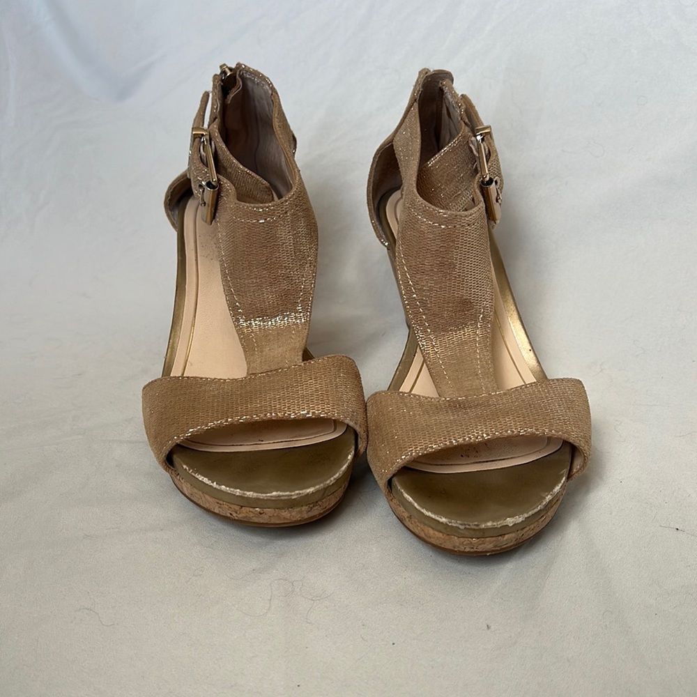 Alex Marie gold wedges.